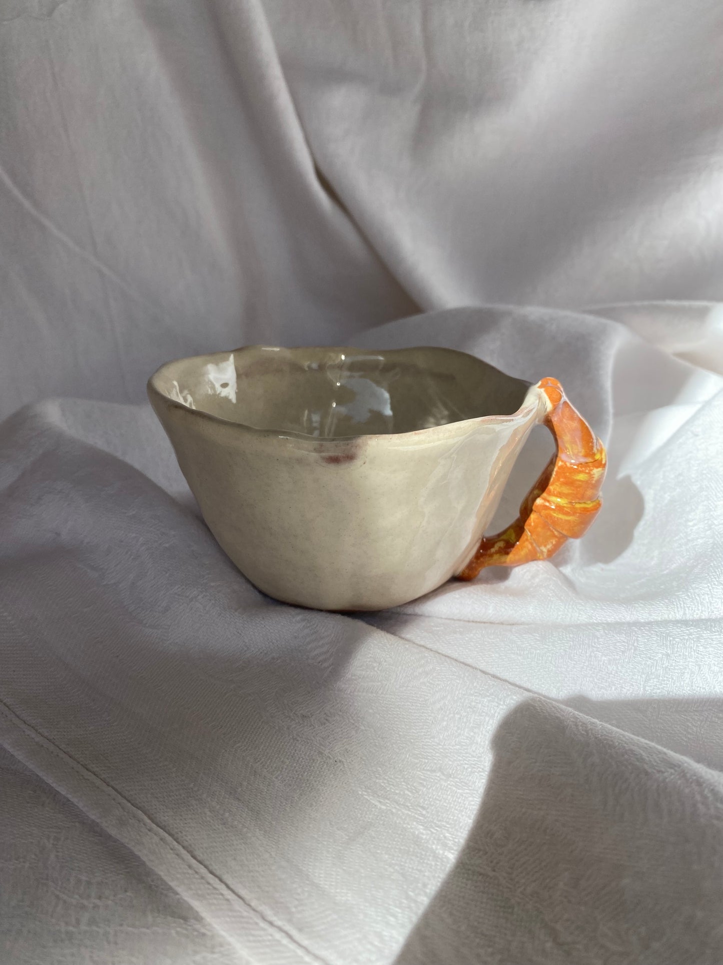 Tasse avec soucoupe à croissant