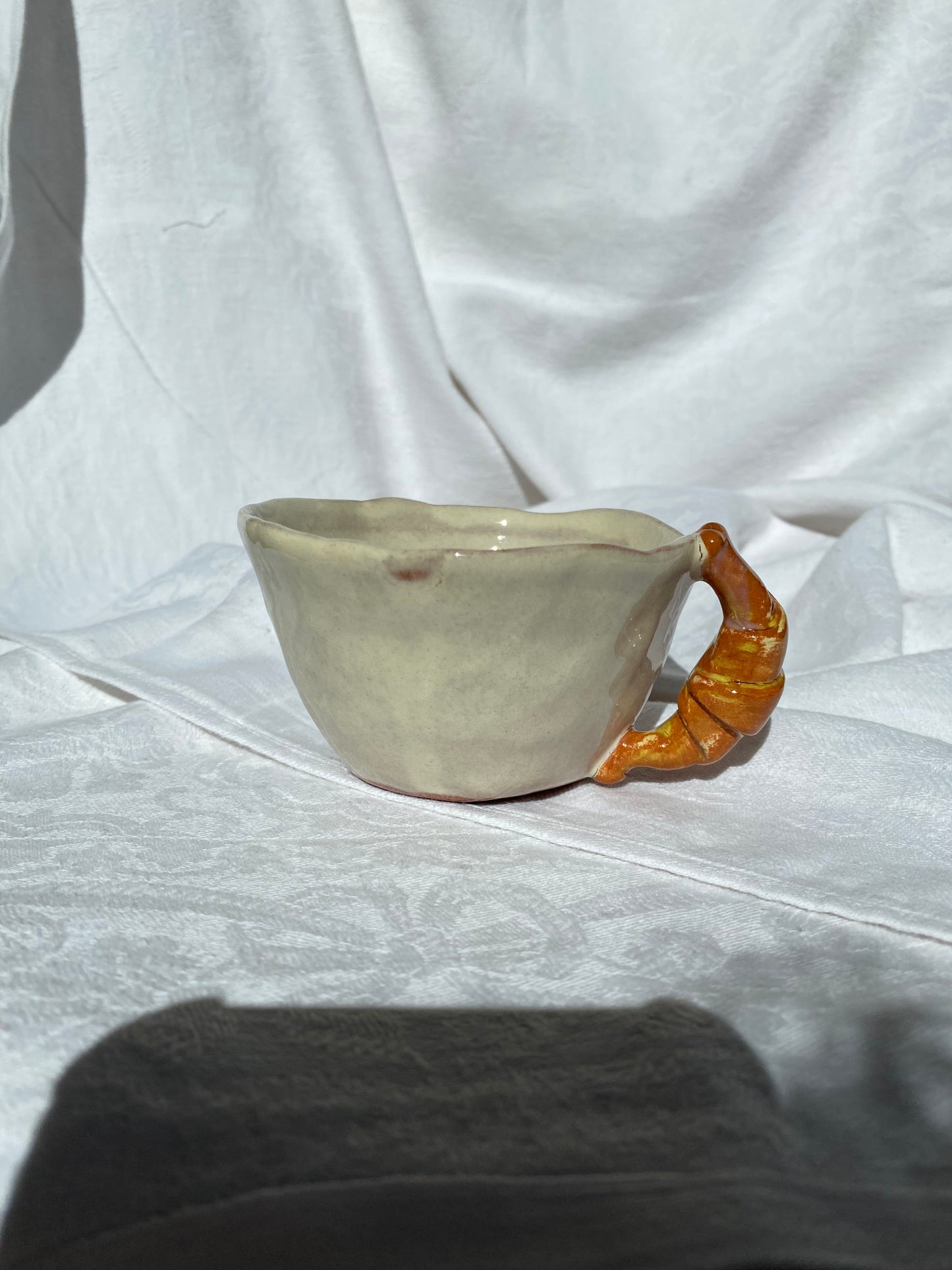Tasse avec soucoupe à croissant