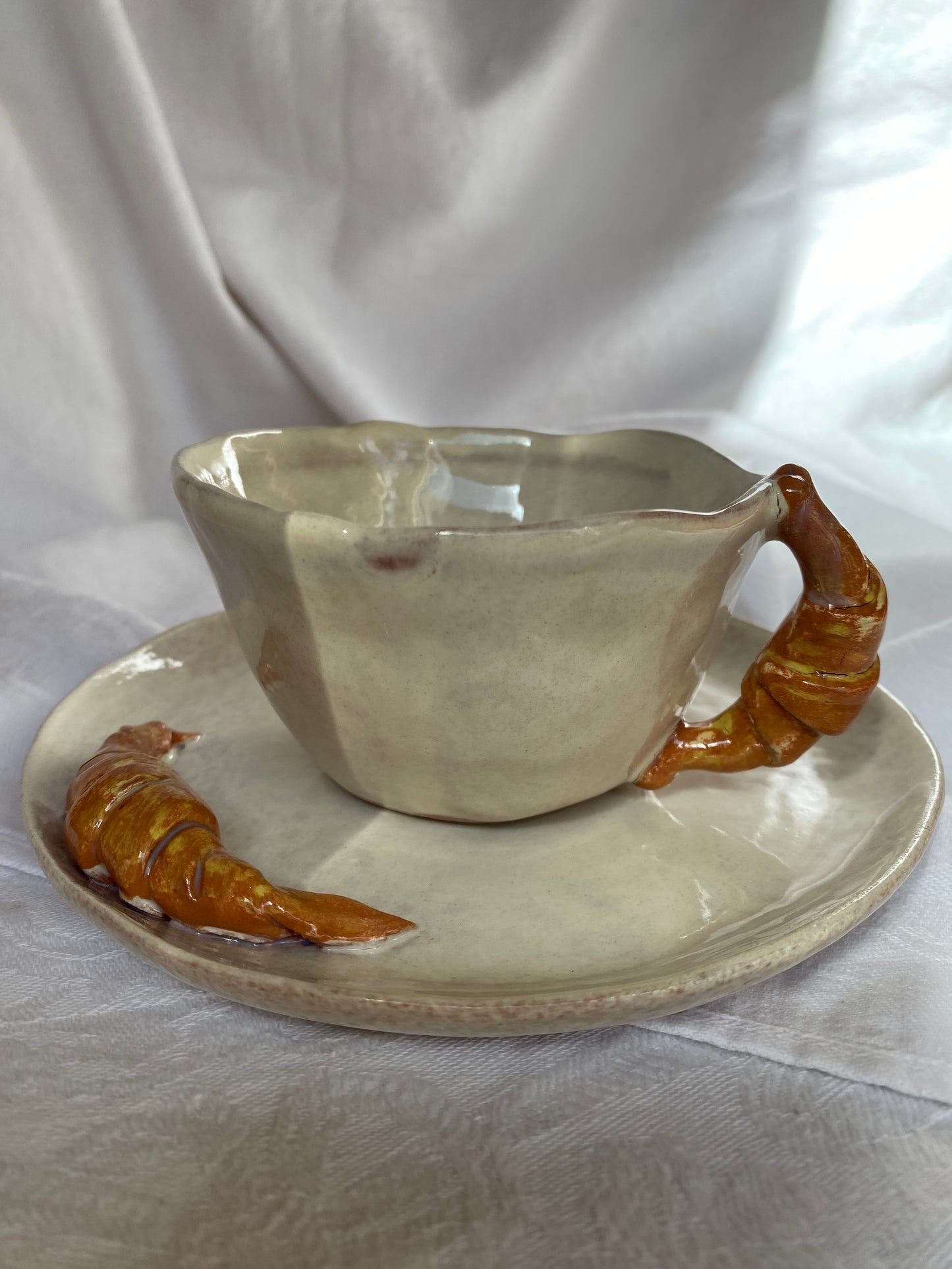 Tasse avec soucoupe à croissant