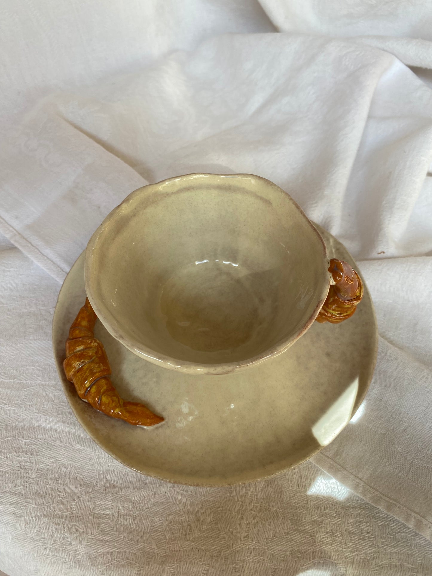 Tasse avec soucoupe à croissant