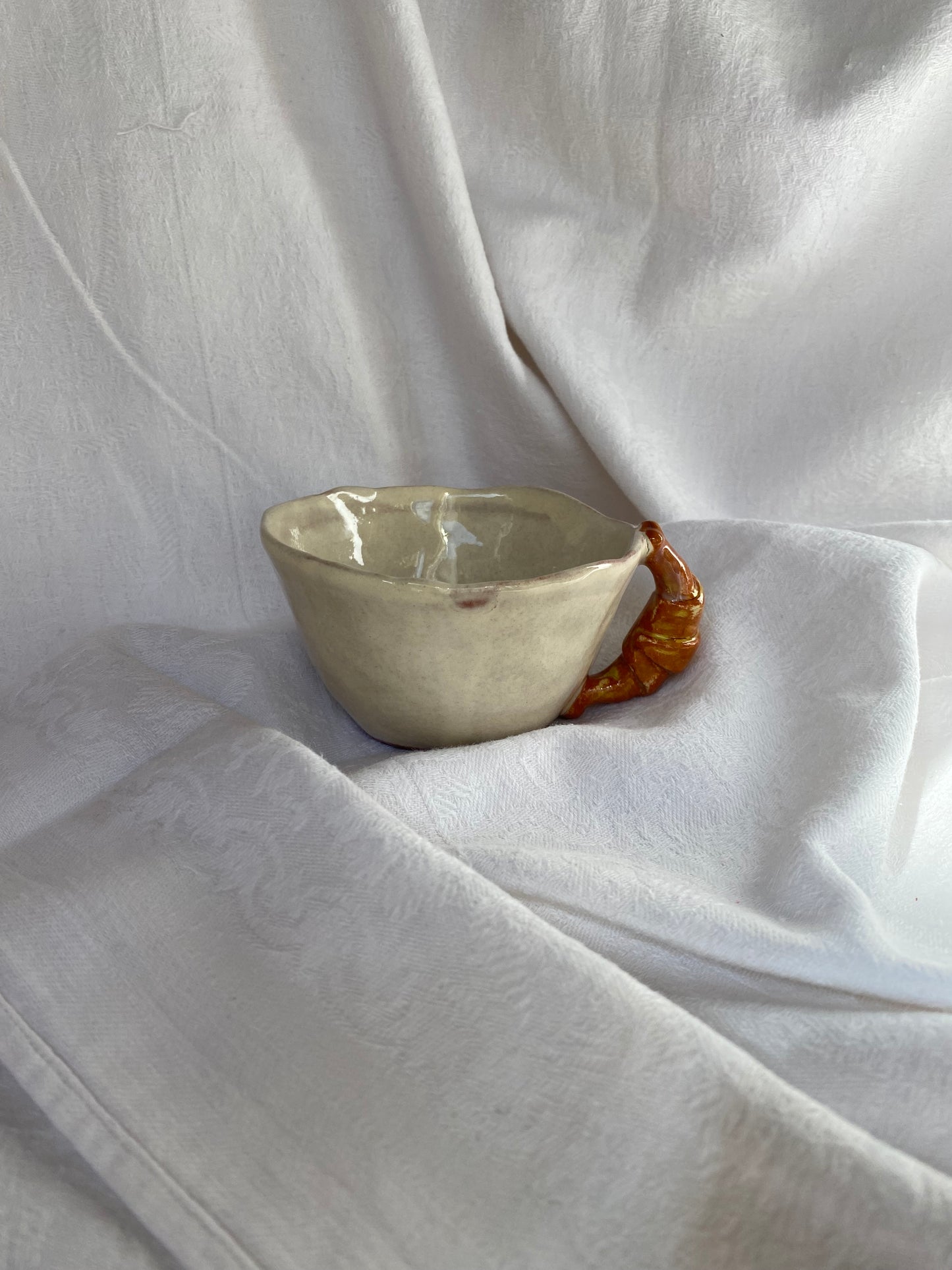 Tasse avec soucoupe à croissant